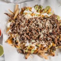 Carne Asada Fries · Or any choice of meat, cheese, sour cream, guacamole.