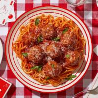 Spaghetti & Meatballs · Spaghetti tossed in a tomato sauce with beef meatballs.