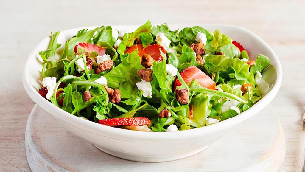 New!  Strawberry Salad · Wild arugula and crisp romaine lettuce with freshstrawberries, cinnamon pecans and goat cheese crumbles,tossed in a raspberry vinaigrette.