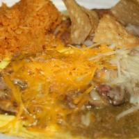 Chile Verde Omelette · Chile verde topped with melted jack and cheddar cheese.  Served with papas, beans and tortil...