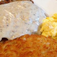 Chicken Fried Steak & Eggs · 11 ounces chicken fried steak with two eggs, hashbrowns or country potatoes and toast or bis...