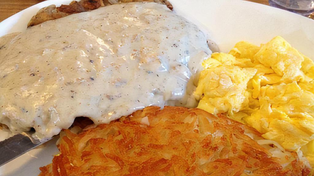 Chicken Fried Steak & Eggs · 11 oz tender steak, breaded and deep fried to a golden brown then smothered with our country gravy (YUMMY)