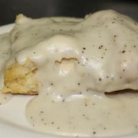 1 Biscuit W/ Gravy · Freshly made fluffy biscuit topped with country gravy