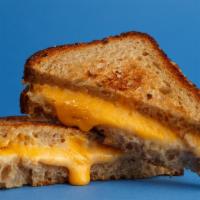 Grilled Cheese · Swiss and American cheese melted between butter toasted bread by Bub & Grandma's, served wit...