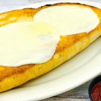Sam-Zone (Large) · Selma’s pizza dough, filled with mozzarella cheese, ricotta cheese, marinara sauce, stuffed ...