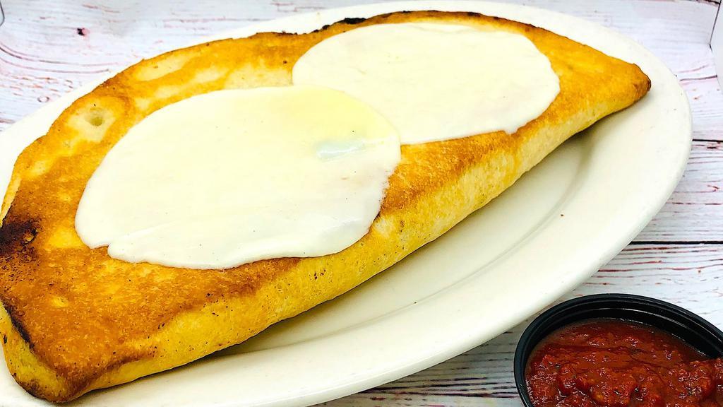 Sam-Zone (Large) · Selma’s pizza dough, filled with mozzarella cheese, ricotta cheese, marinara sauce, stuffed with your choice of two pizza topping ingredients and topped with provolone cheese. Baked until golden brown.