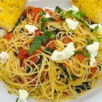 Angel Hair Pomodoro · Angel Hair Pasta, and Fresh Roma Tomatoes sauteed in Olive Oil, with fresh pressed garlic, a...