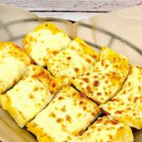 Garlic Cheese Bread · This home-baked roll is slathered with fresh garlic and topped with mozzarella cheese. Serve...