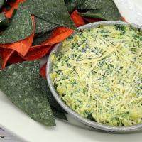 Spinach Artichoke Dip & Chips · Our homemade dip served with tortilla chips.