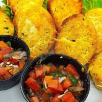Bruschetta Favorito · An Italian favorite served with fresh Roma tomatoes, basil, garlic, red onions, olive oil an...