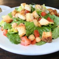 House Salad (Large) · Romaine lettuce, garbanzo beans, tomatoes, and home-baked garlic croutons, with choice of ra...