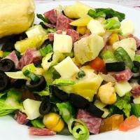 Italian Chopped Salad (Large) · Romaine lettuce, tomatoes, green peppers, provolone cheese, black olives, marinated artichok...
