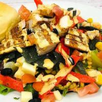 “Sassy” Santa Fe Chicken Chopped Salad (Large) · A perfect combo of romaine lettuce, black beans, red onions, tomatoes, red peppers, provolon...