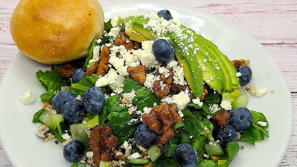 Blueberry Quinoa Salad(Lg) · 5 Way Quinoa Blend, romaine lettuce, blueberries, avocado, cucumbers, crumbled feta cheese, candied walnuts, green onions,Lemon Vinaigrette