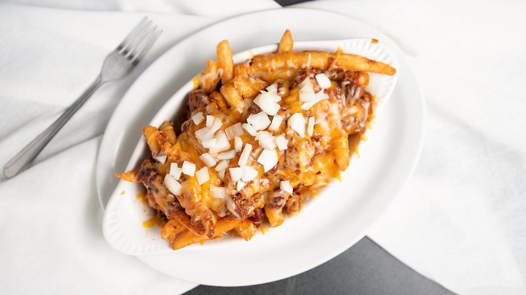 Chili Cheese Taters · House-made chili, diced onion. Choice of beer cheese sauce or melted shredded cheddar-jack.