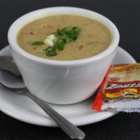 Clam Chowder · New england style, topped with green onion.