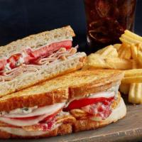 Talkin' Turkey Melt - Combo · We're talkin' turkey, bacon, tomatoes, Provolone cheese and sun-dried tomato mayo on grilled...