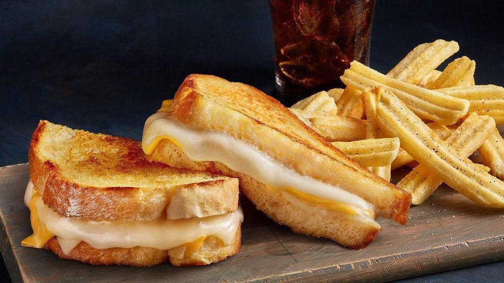 Classic Meltdown - Combo · Ooey gooey original melty goodness - get Sharp White Cheddar, Wisconsin Provolone and American cheese on grilled artisan bread. Includes your choice of a drink and a side to round out the meal.