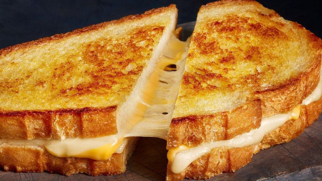 Classic Meltdown · Ooey gooey original melty goodness - get Sharp White Cheddar, Wisconsin Provolone and American cheese on grilled artisan bread.