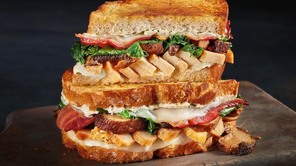 Feeling Groovy Melt · Get your groove on with seasoned grilled chicken breast, bacon, mushrooms, Wisconsin Provolone, spinach and mayo on grilled artisan bread.