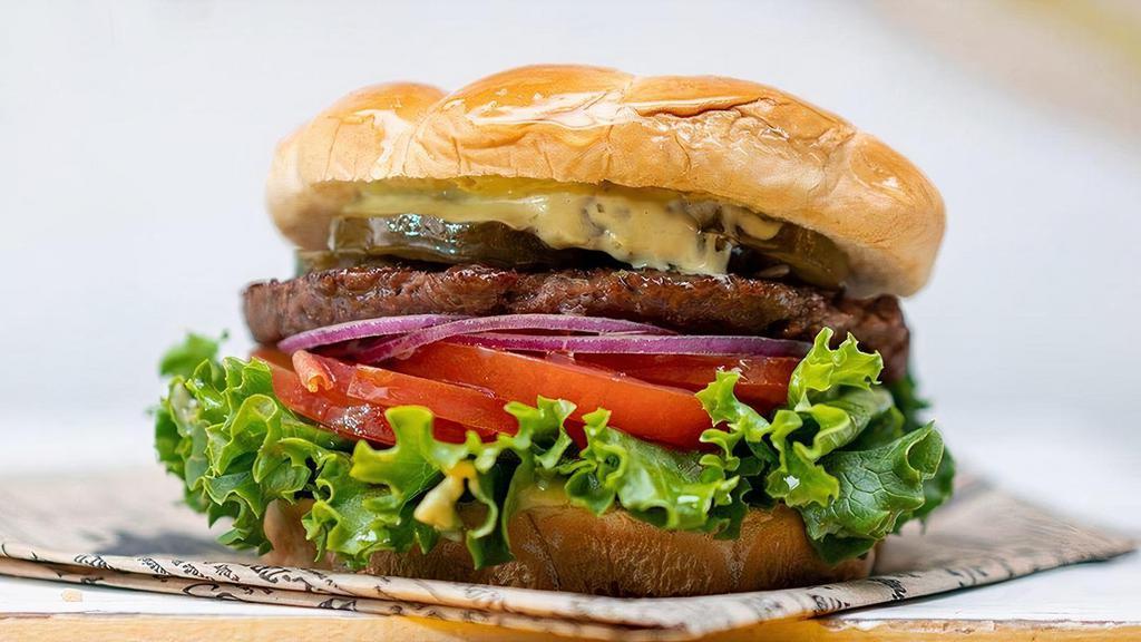 Impossible Vegan Burger · impossible patty, vegan white cheddar cheese, arugula, tomato, red onion, tofu mayo, pickles toasted brioche vegan bun
