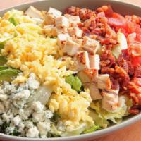 Cobb Salad · Chicken, bacon, hard-boiled egg, bleu cheese, tomatoes, avocado with your favorite dressing.