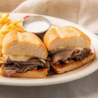 French Dip · Oven-roasted beef sliced thin on a garlic French roll  with Swiss cheese, beef au jus and cr...