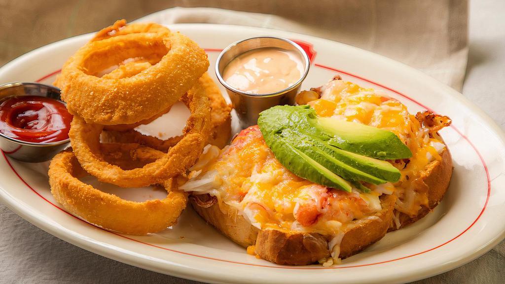 Shrimp & Crab Melt · Hof’s hut signature item. Crabmeat blend and shrimp with melted cheese, bacon, tomatoes, and avocado served open-face on garlic sourdough.