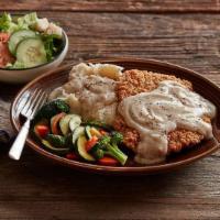 Chicken Fried Steak · Beefsteak breaded and fried like chicken, smothered with country gravy.
