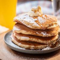 Flapjack Pancakes · 4 griddle buttermilk pancakes with syrup, butter and powdered sugar with your choice of pres...