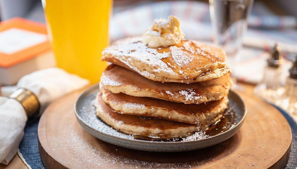 Flapjack Pancakes · 4 griddle buttermilk pancakes with syrup, butter and powdered sugar with your choice of preserve.