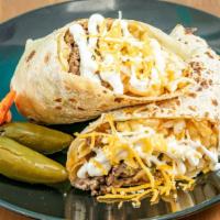 California Burrito · carne asada, fries, cheese, pico de Gallo, & sour cream