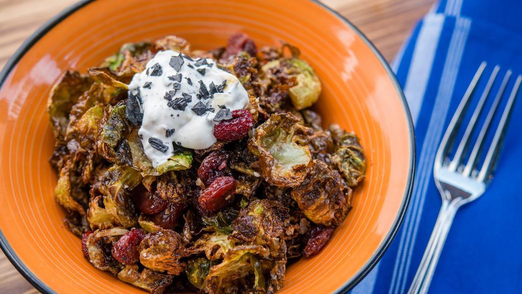 Fried Brussels Sprouts · Marcona almonds, dried cranberries, mint yogurt.