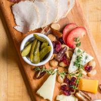 Artisan Cheese & Charcuterie Plate · accompaniments & bread