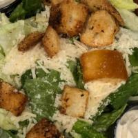 Caesar Salad · crisp romaine leaves, crunchy croutons, classic caesar dressing, white anchovy