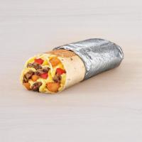 Grande Toasted Breakfast Burrito Steak · Steak, fluffy eggs, melted three-cheese blend, potato bites, and tomatoes wrapped up in a fl...