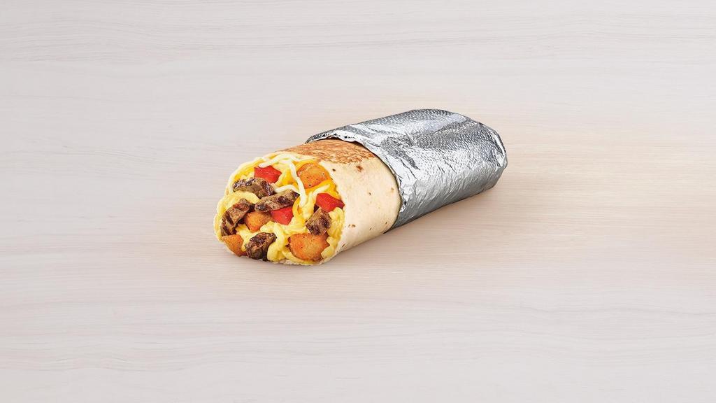 Grande Toasted Breakfast Burrito Steak · Steak, fluffy eggs, melted three-cheese blend, potato bites, and tomatoes wrapped up in a flour tortilla and grilled.
