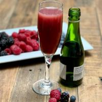 Triple Berry Mimosa · A champagne split and orange juice with strawberry, raspberry, blueberry and blackberry. (27...