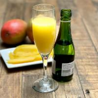 Mango Mimosa · A champagne split and orange juice with mango. (270 Cal)