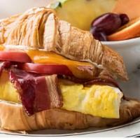 Croiss Egg & Bac Sandwich · Bacon, two fried eggs, sliced tomatoes, melted cheddar and mayonnaise on a flaky croissant. ...