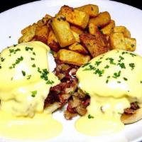 Corned Beef Hash Benedict · Slow-cooked corned beef brisket and poached eggs, topped with hollandaise sauce on a grilled...