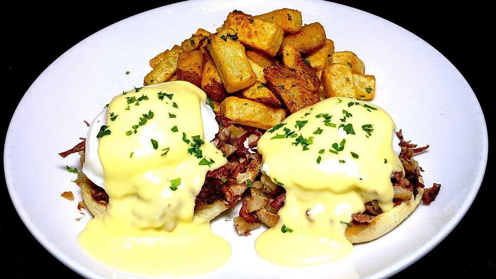 Corned Beef Hash Benedict · Slow-cooked corned beef brisket and poached eggs, topped with hollandaise sauce on a grilled English muffin. Available every day until 2:00PM