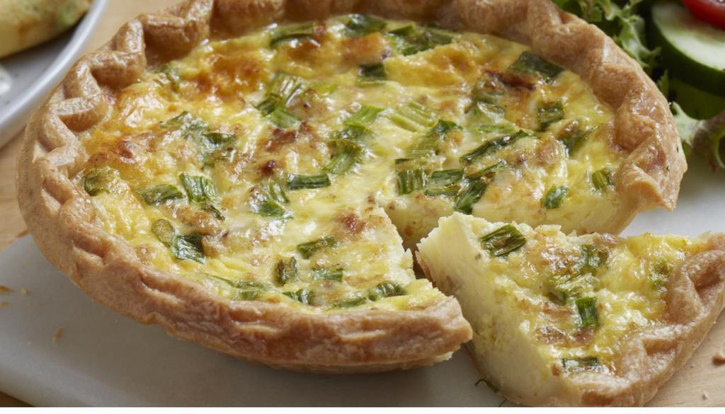 Quiche Lorraine · Housemade with hickory-smoked bacon, green onion, mozzarella and aged parmesan. Served with petite house salad. (700 Cal)