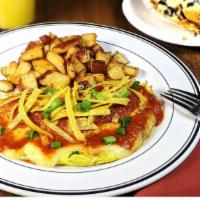 Santa Fe Omelet · Three eggs, diced jalapenos, cilantro, tomatoes, onions, tortilla strips, melted monterey ja...