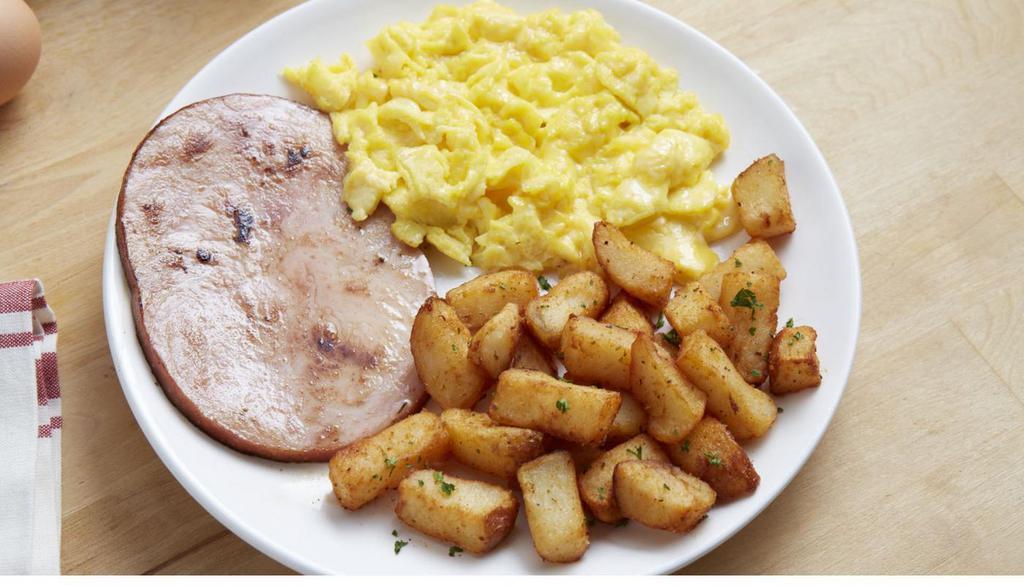 Hickory-Smoke Ham & Eggs · Two eggs* (160 Cal) served any style with hickory smoke ham (300-910 Cal), roasted potatoes (150 Cal) and toast (130-400 Cal) or a Muffin (520-860 Cal). Substitute a croissant. (360 Cal) 99¢