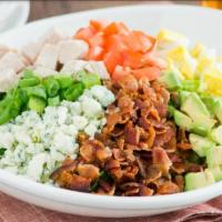 Cobb Salade · Slow-roasted turkey, bacon, chopped egg, avocado, tomatoes, green onions and crumbled bleu c...