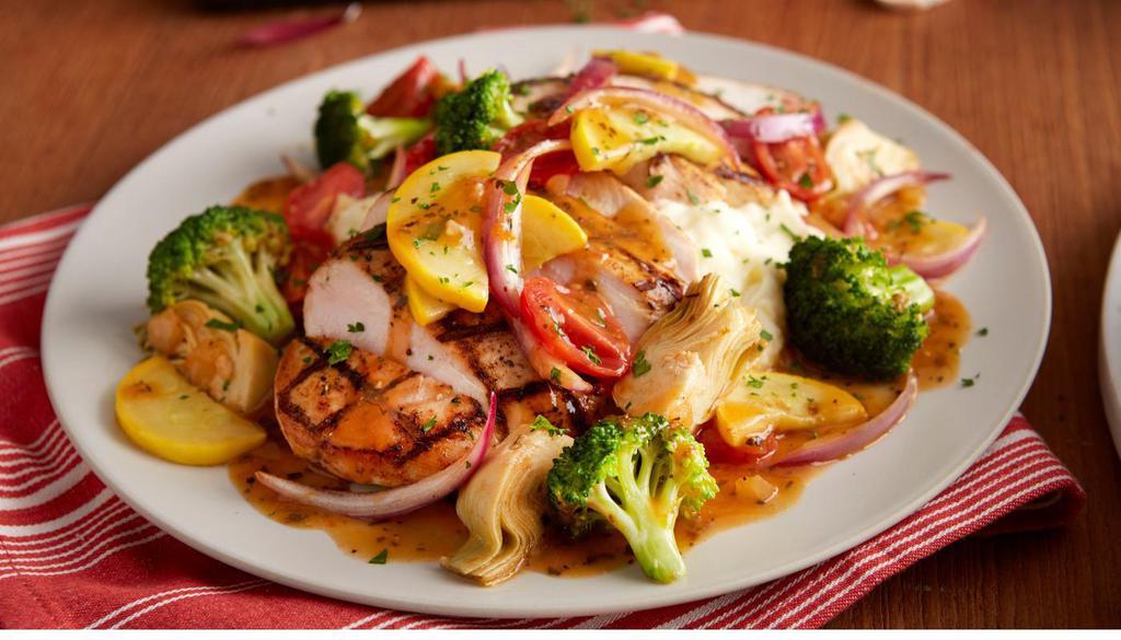 Chicken & Artichokes · Grilled chicken, mashed potatoes, sautéed vegetables and artichoke hearts served in a savory sauce. (610 cal).