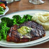 Ribeye Steak · 28-day aged, 10 oz. USDA choice ribeye steak. House-made herbes de Provence butter available...