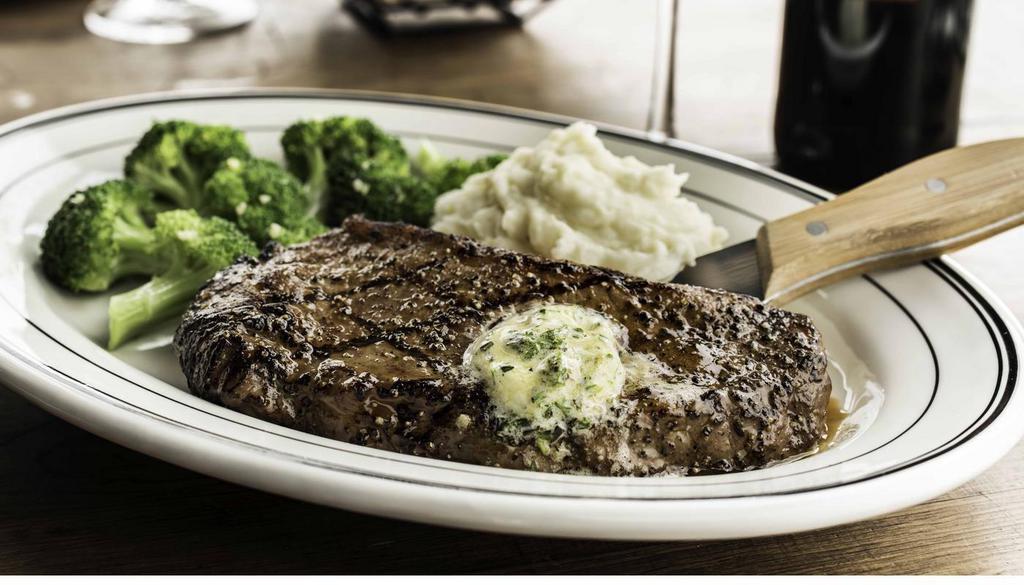 Grill Ny Steak · NEW YORK STRIP STEAK* 10 oz. USDA Choice New York Strip dry-aged 28 days, blackened or grilled. Housemade herb butter available upon request. Served with choice of two sides. (750 Cal)