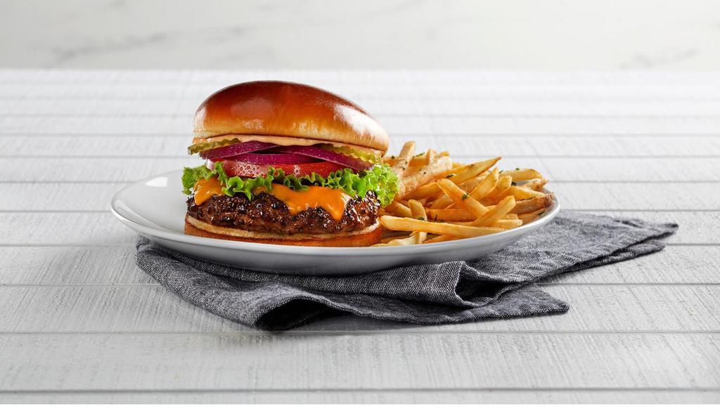 Cheese Burger · 100% USDA premium beef patty with your choice of cheese, lettuce, tomatoes, red onions, pickles and thousand island dressing on a toasted brioche bun. (840-870 cal) .